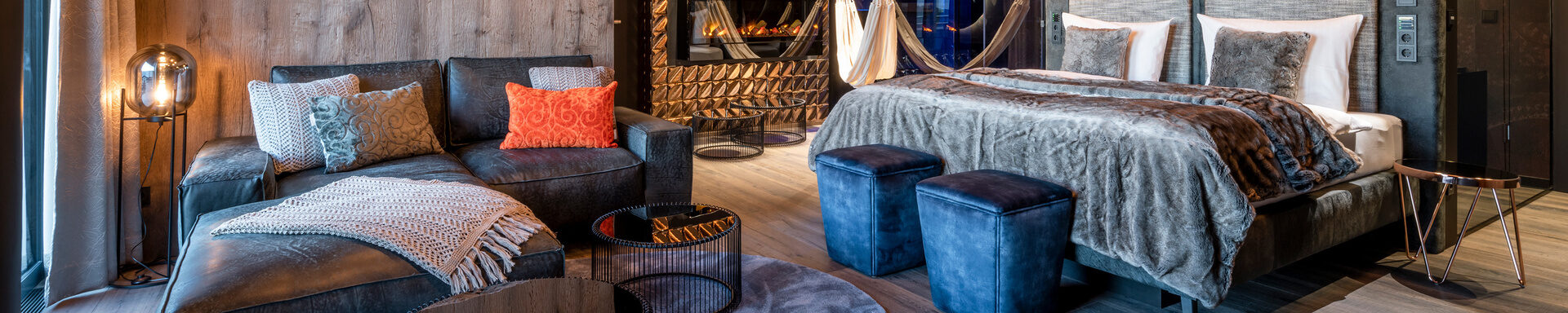 Buchen Sie unsere Romantiksuite im Wellnesshotel Bayerischer Wald - Moderne Luxussuite mit Whirlpool im Wellnesshotel Hüttenhof und Luxus Bergchalets